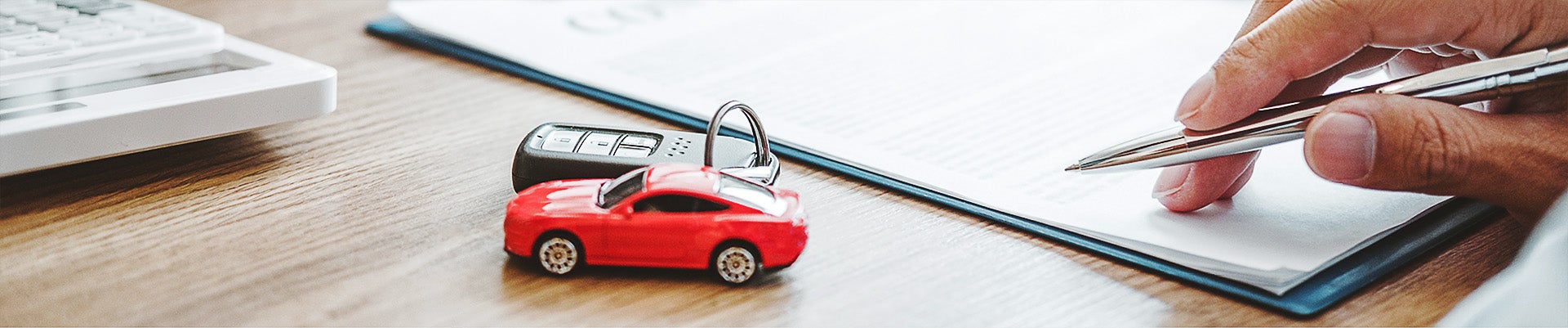 Business person writing a contract